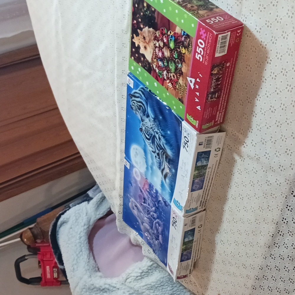 Three different puzzles. 2 are 750 pieces one is 550 pieces.